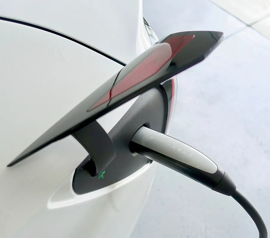 with the new charge port cover and Mobile Charger 2.0 (more efficient, lighter and longer)